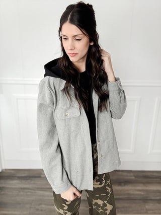 gray shacket with black hoodie