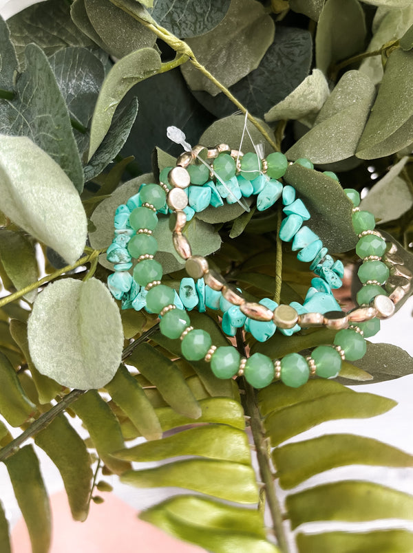 Three bracelets. Cut glass, Chippy stone, Flat round beads. shades of green/blue