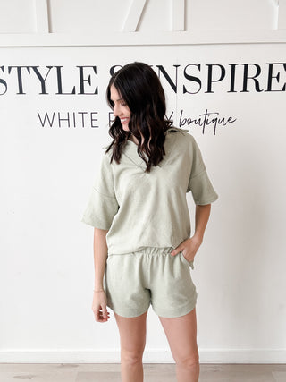 Arlys Split Neck Short Sleeve Top