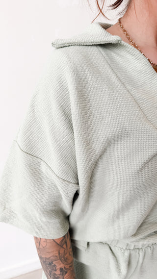 Arlys Split Neck Short Sleeve Top