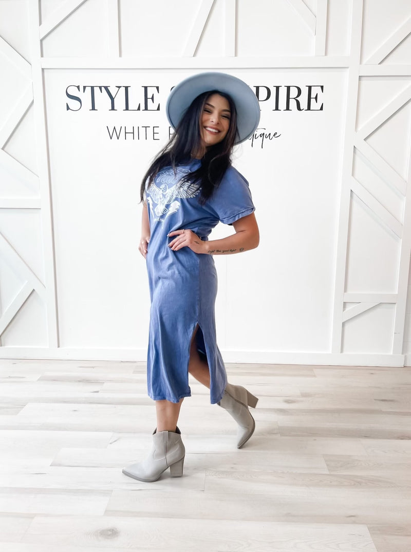 Washed denim color, Born To Be Free Graphic Dress. The midi length and side slits create flattering movement, while the short sleeves and crew neck keep the look classic.
