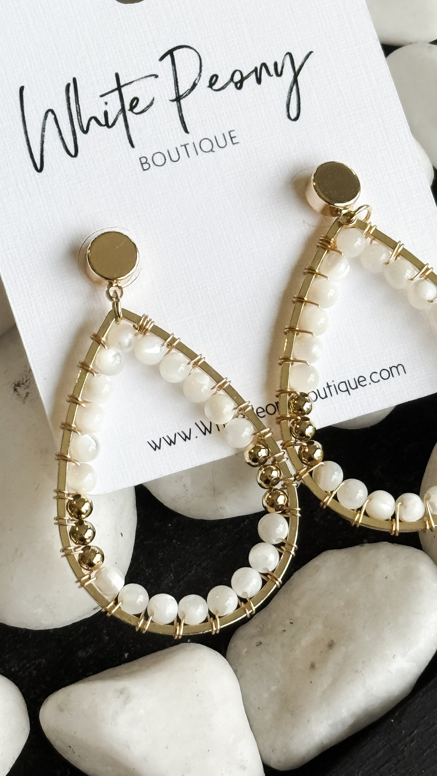 Gold hoop earrings with pearl beads 