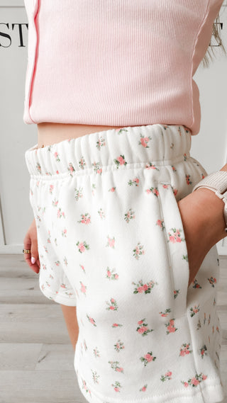 White floral shorts with pockets