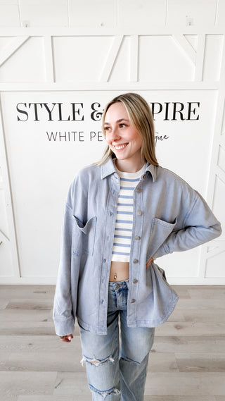 Woman wearing a soft Shacket that looks like denim