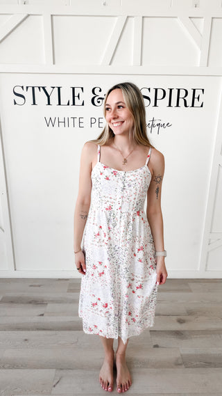 Woman wearing a floral patchwork long dress