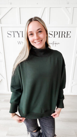 green mock neck sweater