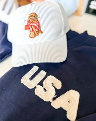 Sitting Dog with Flag Trucker Hat