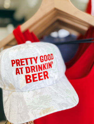 Pretty Good At Drinkin' Camo Trucker Hat