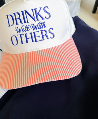 Drinks Well With Others Trucker Hat
