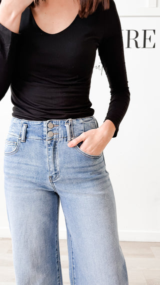 Risen High Rise Wide Hem Jeans