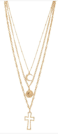 Two gold necklaces with a cross pendant and circular charm on a white background
